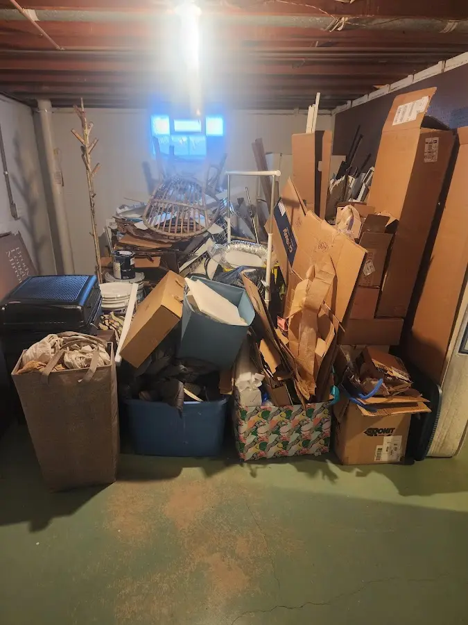 Roll-off dumpster container at job site for Construction Dumpster Rental in De Pere